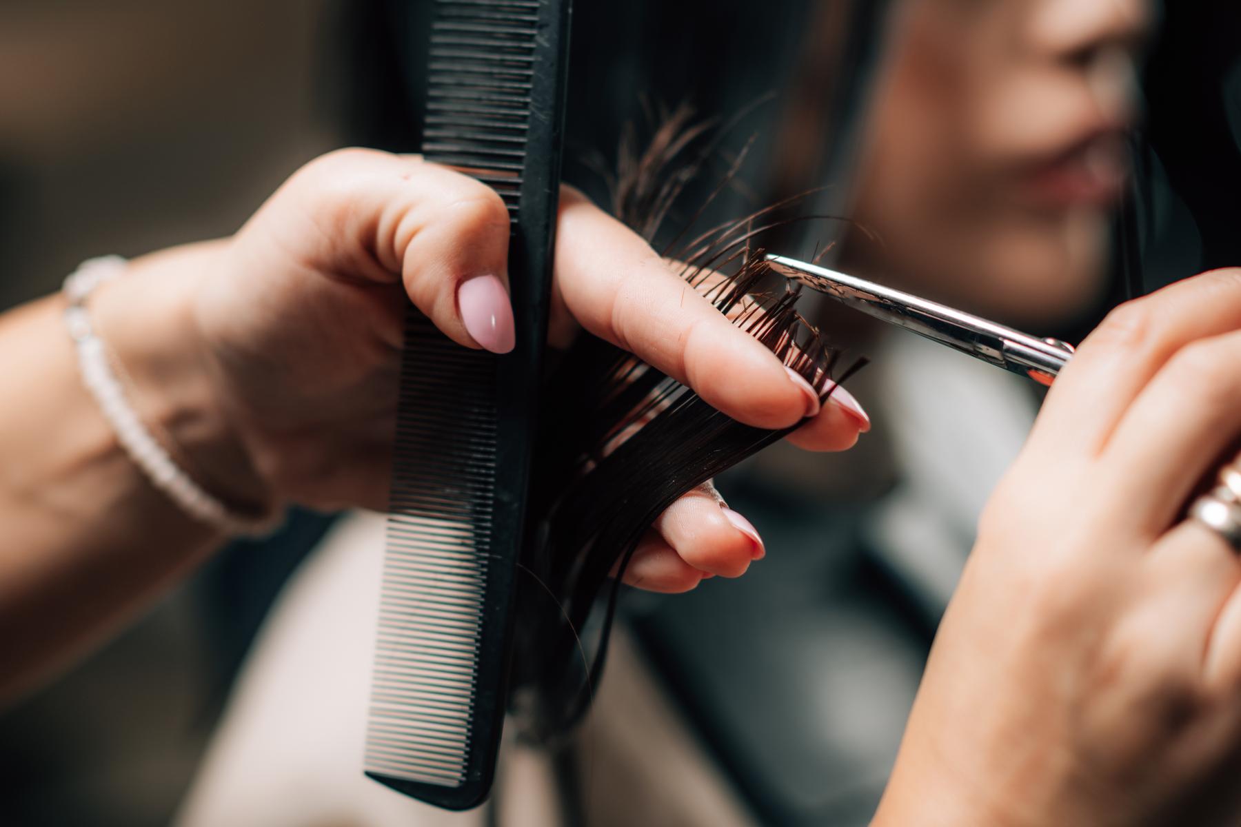 beautiful young woman in hair salon